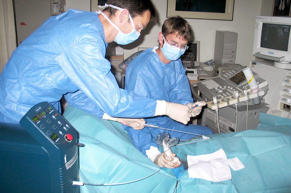 Ultrasound-guided interstitial laser therapy